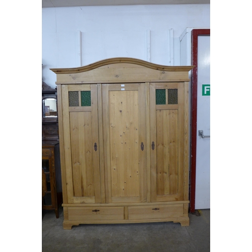 123 - A 19th Century French pine armoire