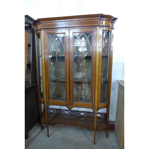 128 - An Edward VII inlaid mahogany display cabinet