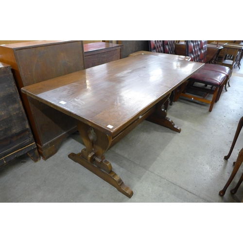 145 - An oak refectory table