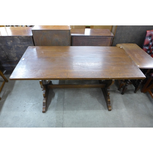 145 - An oak refectory table