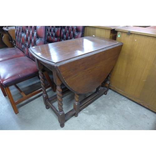 151 - An oak barleytwist gateleg table