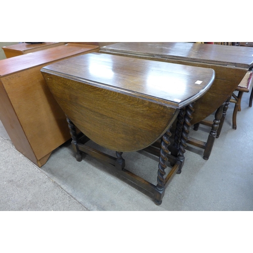 155 - An oak barleytwist gateleg table