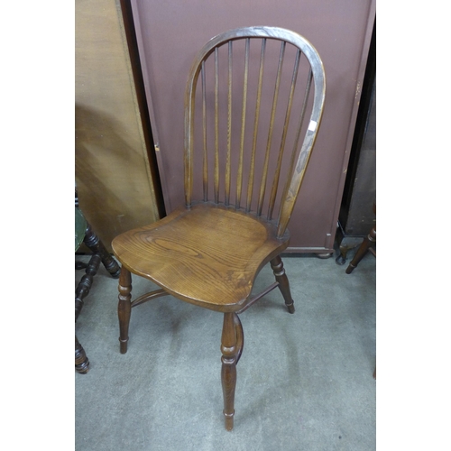 161 - A set of five elm and beech Windsor style chairs