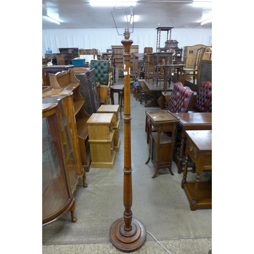 163 - An inlaid beech standard lamp