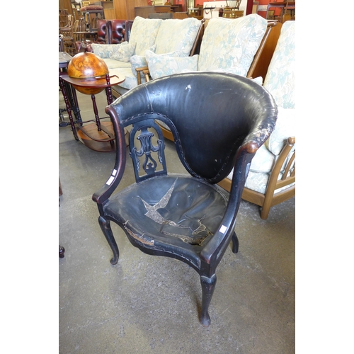 175 - An Edward VII ebonised armchair