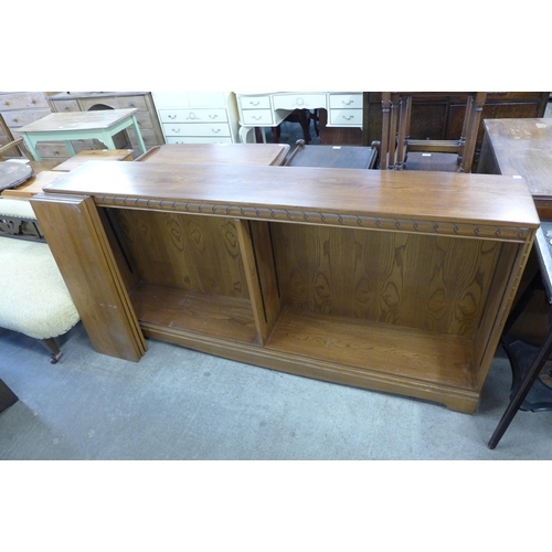 188 - Three Ercol Golden Dawn elm open bookcases