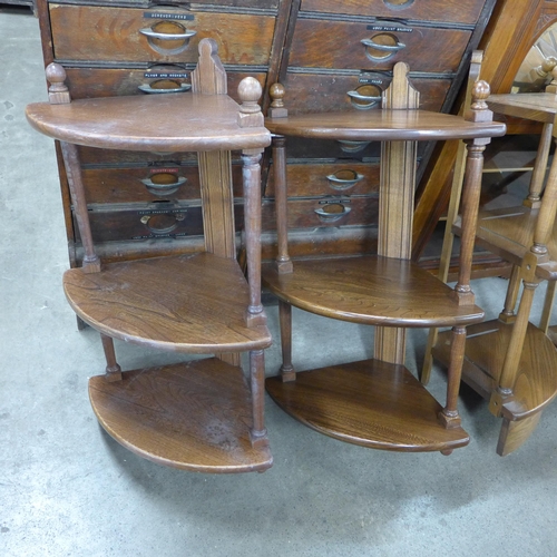 223 - Four Ercol Golden Dawn elm and beech corner whatnots