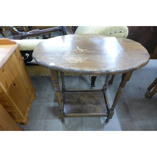 232 - A small carved oak sewing box, an oak occasional table and a teak occasional table