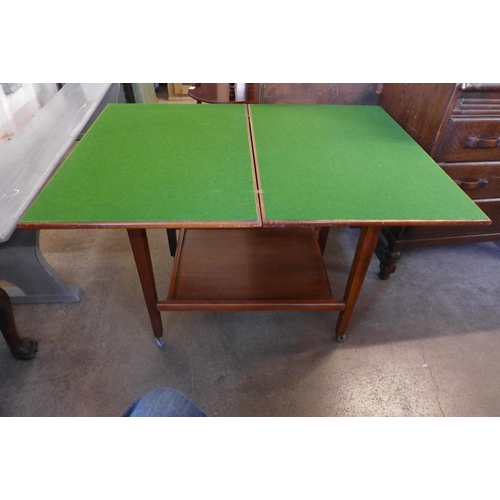 300 - A teak fold over card table