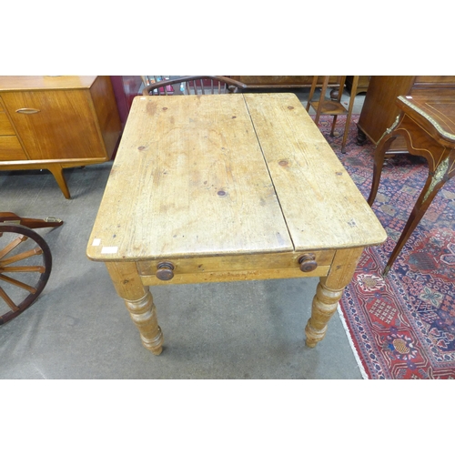 4 - A Victorian waxed pine single drawer farmhouse kitchen table, 72cms h, 105cms l, 80cms w