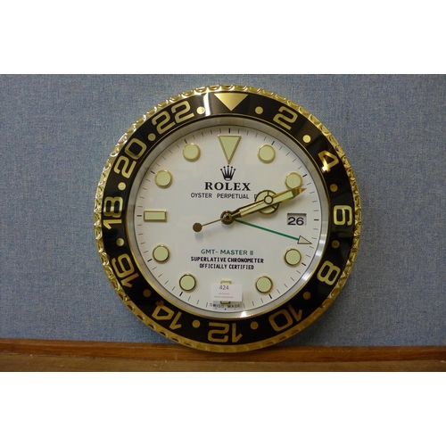 424 - A Rolex style dealer's display wall clock