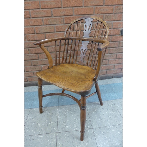 5 - A 19th Century elm and yew Windsor chair