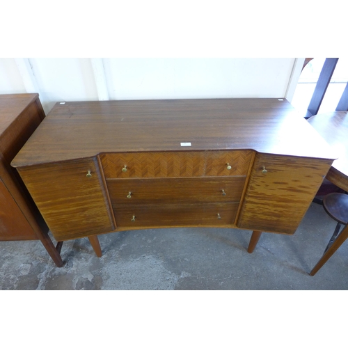 53 - A Uniflex walnut concave sideboard