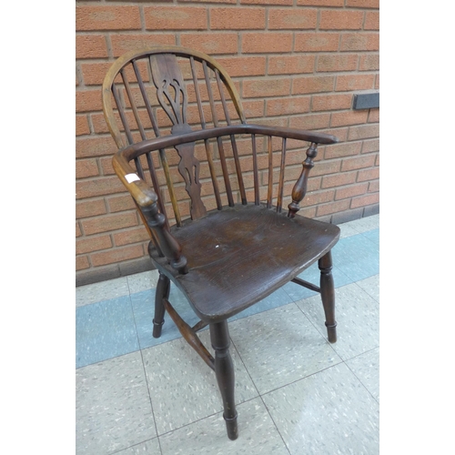 6 - A 19th Century elm and yew Windsor chair