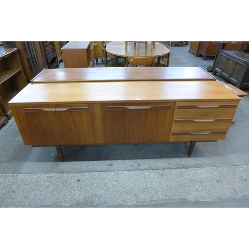 74 - A teak sideboard