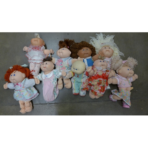 1176 - Nine 1980's and 1990's Cabbage Patch dolls