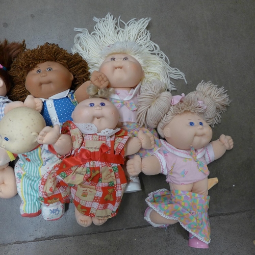 1176 - Nine 1980's and 1990's Cabbage Patch dolls