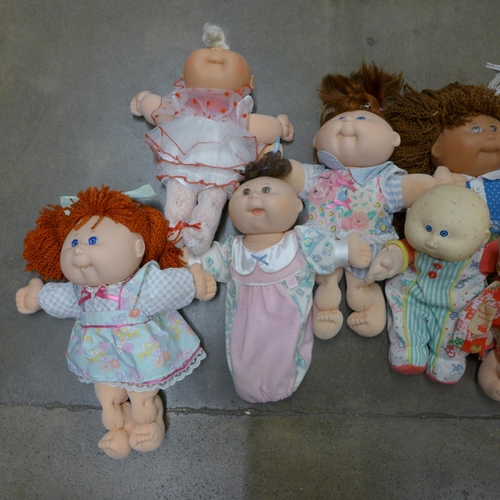 1176 - Nine 1980's and 1990's Cabbage Patch dolls