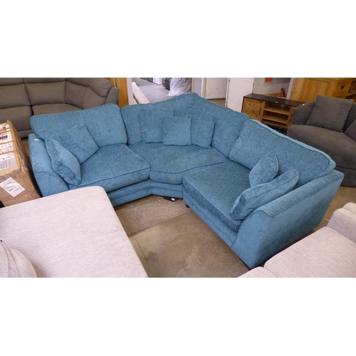 1417 - A teal upholstered corner sofa