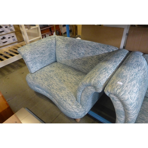 1741 - A teal and cream two seater sofa and armchair