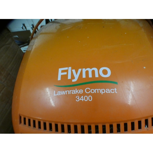 2087 - Flymo Roller compact 3400 lawn mower and Flymo lawn rake compact 3400