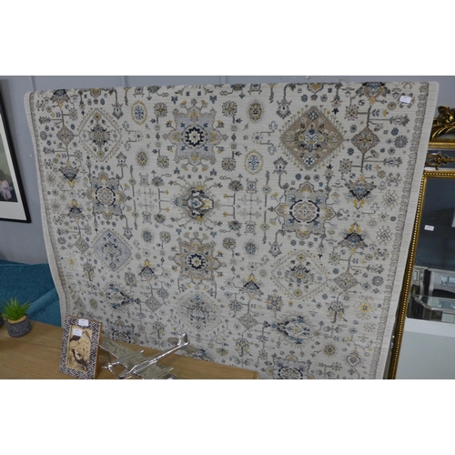 1429 - An ivory ground carpet, all over Ziegler design 300 x 200