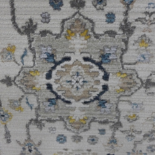 1429 - An ivory ground carpet, all over Ziegler design 300 x 200