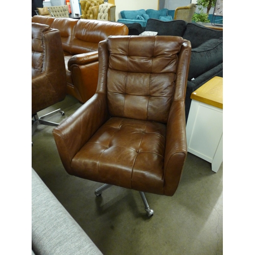 1451 - An Additions Commander brown leather swivel chair