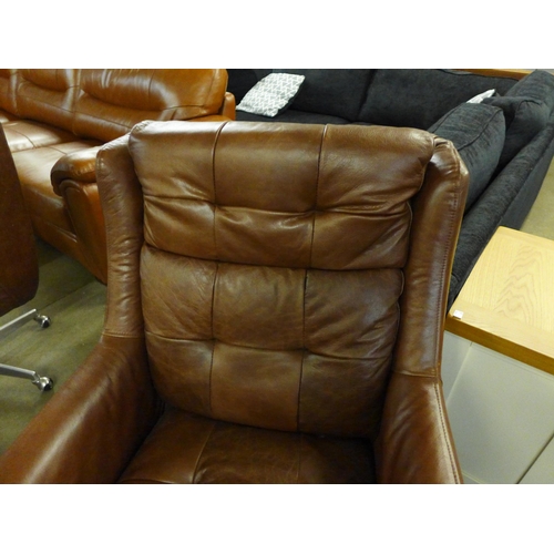 1451 - An Additions Commander brown leather swivel chair