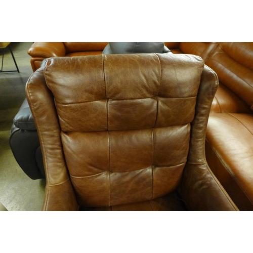 1451 - An Additions Commander brown leather swivel chair