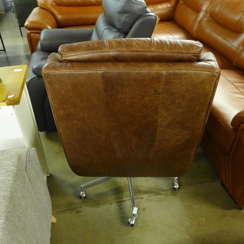 1451 - An Additions Commander brown leather swivel chair