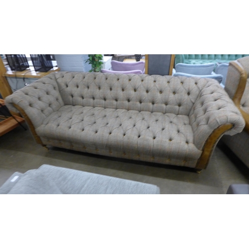 1462 - A Chesterfield Harris tweed and cerato leather three seater sofa