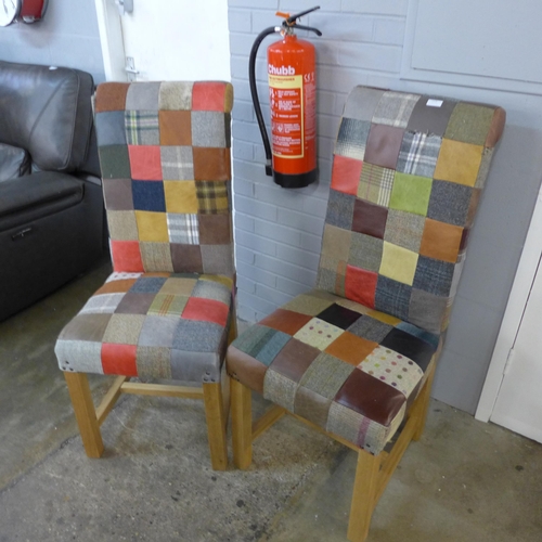 1476 - A pair of patchwork and leather rollback chairs - some damage