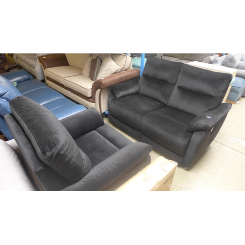 1730 - A black velvet upholstered two seater sofa and armchair, both manual recliners