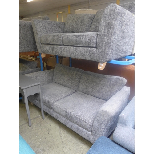 1751 - A grey textured weave two seater and three seater sofa (worn, damage to arm)