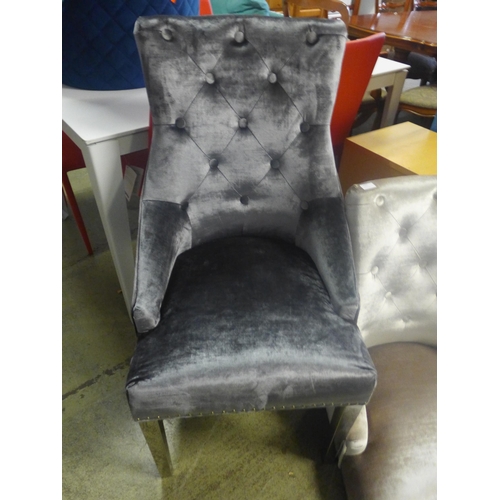 1757 - One dark and one light grey velvet upholstered and studded chairs with metal legs. One missing fitti... 