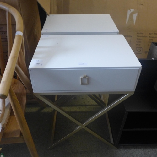 1772 - A pair of  white single drawer bedside tables with cross legs