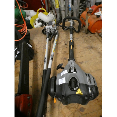 2313 - A Titan petrol multi tool with chainsaws and hedge cutting attachment - TTK587GDO