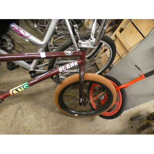 2365 - A red metal uni cycle with blank BMX