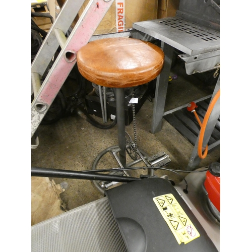 2374 - An industrial style bar stool with leather seat pad