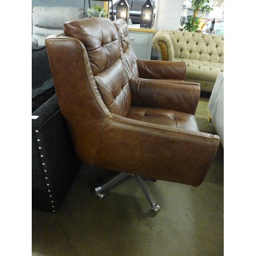 1452 - An Additions Commander brown leather swivel chair