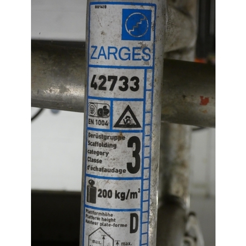 2381 - Zarges aluminium scaffold tower with Borad safety rails 4 upright sections, work platform and  safet... 