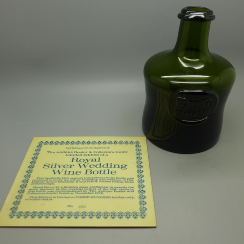 714 - A limited edition Royal Silver Wedding wine bottle with certificate, 254/300, dated 1972