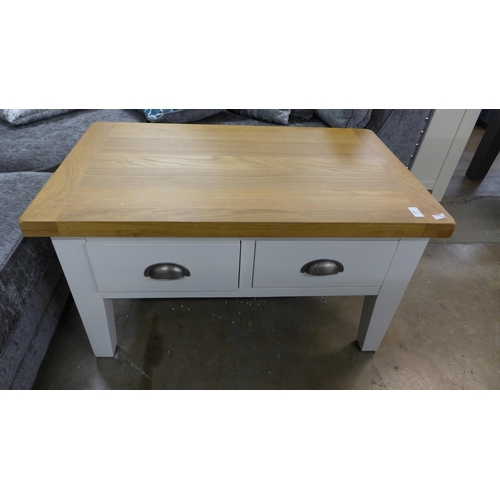 1326 - A Hampshire white painted and oak large coffee table *This Lot is Subject to VAT*