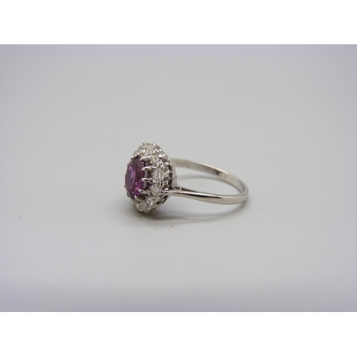 1086 - An 18ct gold, diamond and pink stone cluster ring, 3.6g, O