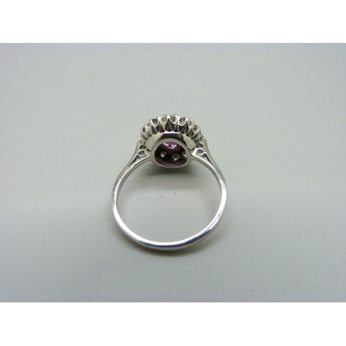 1086 - An 18ct gold, diamond and pink stone cluster ring, 3.6g, O