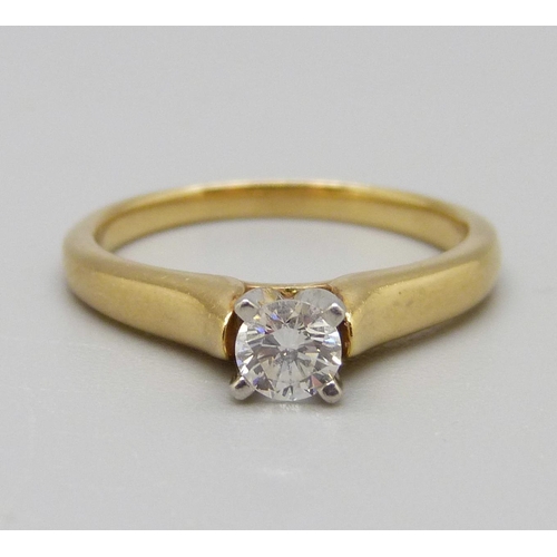 1096 - An 18ct gold, platinum set diamond solitaire ring, 4.3g, N, 0.32 carat weight, marked on the shank