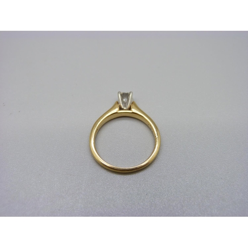 1096 - An 18ct gold, platinum set diamond solitaire ring, 4.3g, N, 0.32 carat weight, marked on the shank