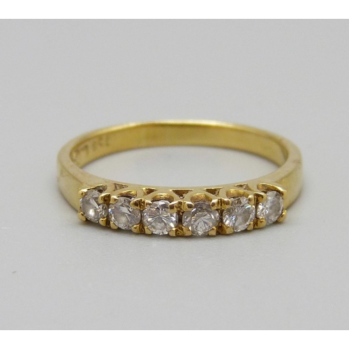 1097 - An 18ct gold and six stone diamond ring, 2.6g, M