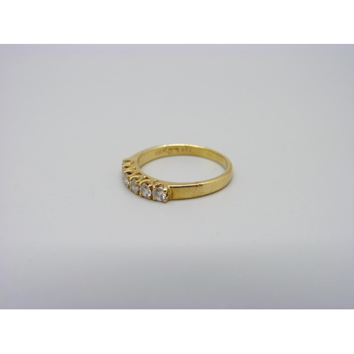 1097 - An 18ct gold and six stone diamond ring, 2.6g, M